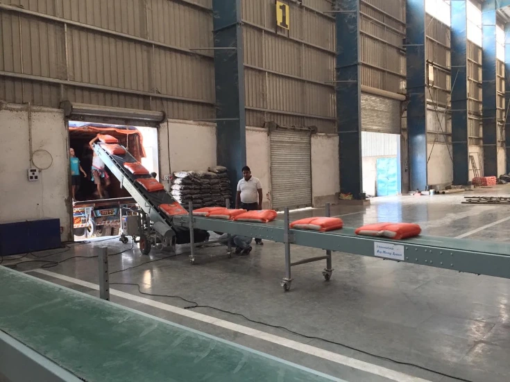 Horizontal mover with truck loading conveyor