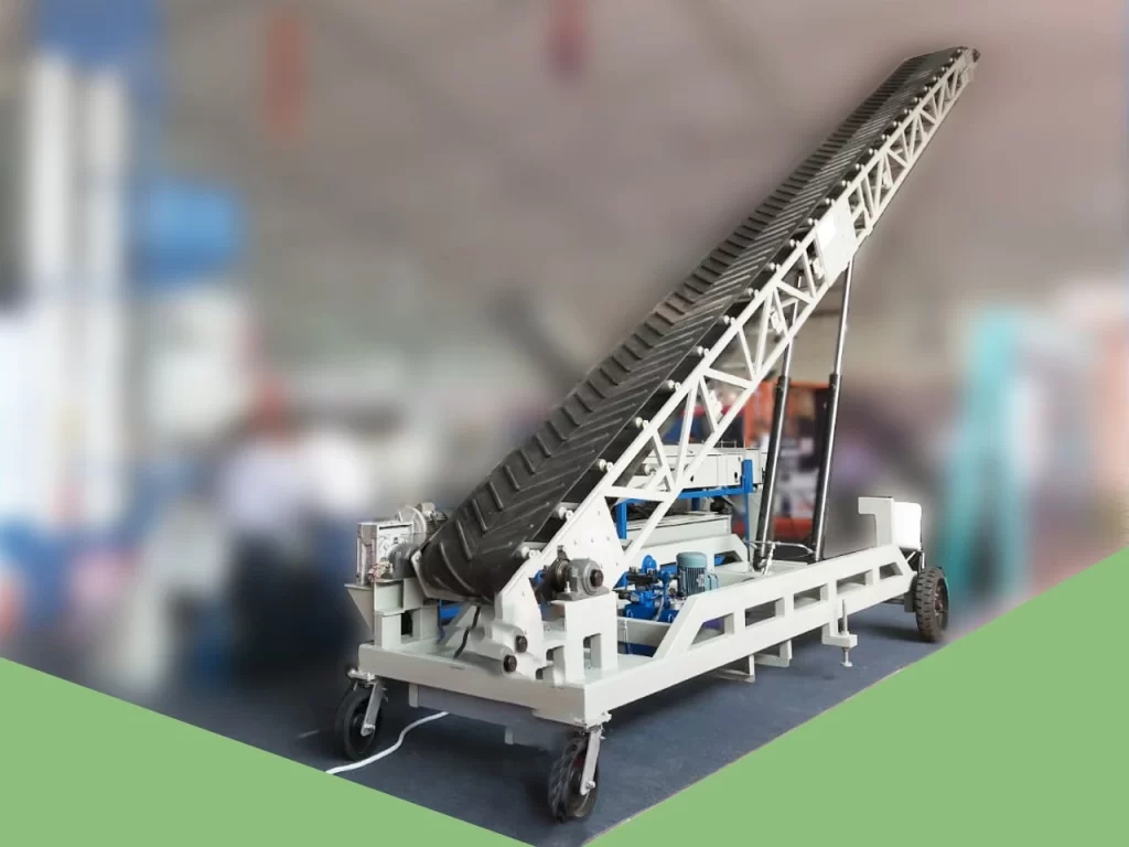 Truck loading conveyor with chevron belt