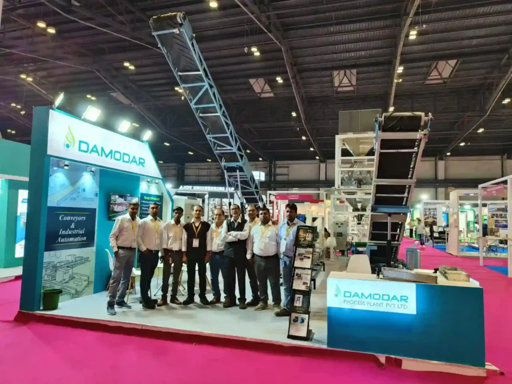 Damodar process team at an exhibition